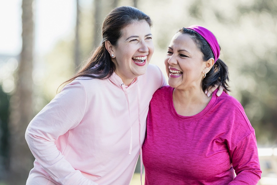 Two women in pink