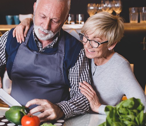 Couple prepping dinner Couple prepping dinner